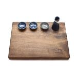 Souvla Braai Walnut Chopping Board with bowls on top for decoration